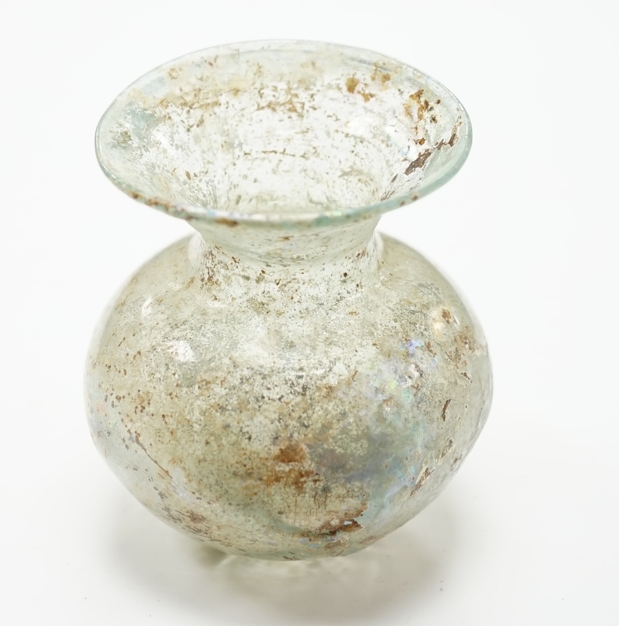 A Roman iridescent glass vessel on stand, 8cm high